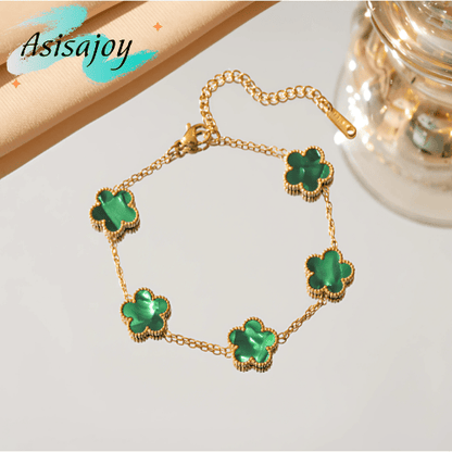 Essence - Pulsera floral en acero inoxidable y chapado en oro de 18k