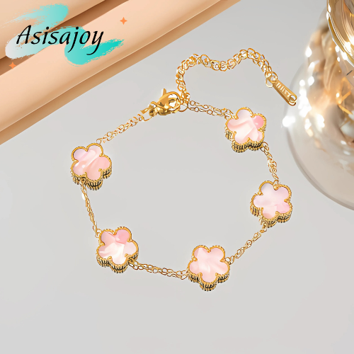 Essence - Pulsera floral en acero inoxidable y chapado en oro de 18k