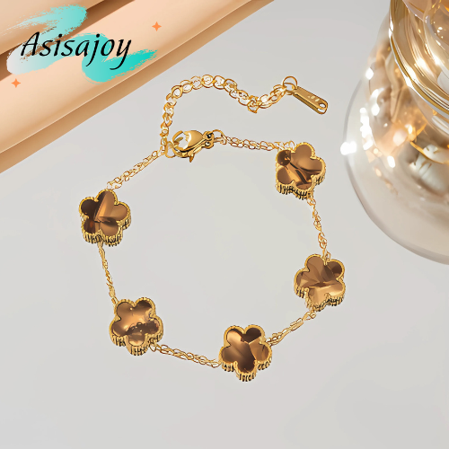 Essence - Pulsera floral en acero inoxidable y chapado en oro de 18k