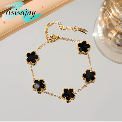 Essence - Pulsera floral en acero inoxidable y chapado en oro de 18k