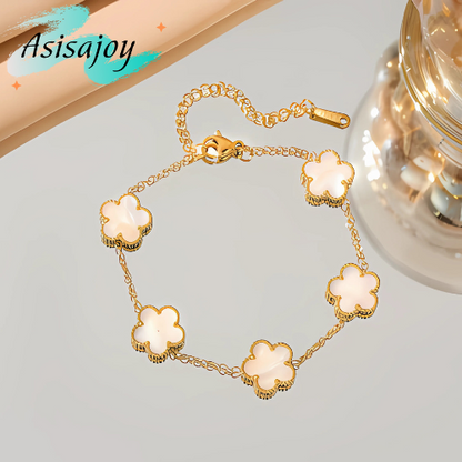 Essence - Pulsera floral en acero inoxidable y chapado en oro de 18k