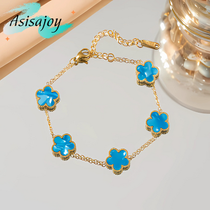 Essence - Pulsera floral en acero inoxidable y chapado en oro de 18k