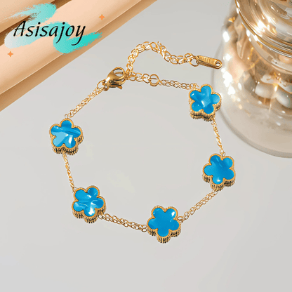 Essence - Pulsera floral en acero inoxidable y chapado en oro de 18k