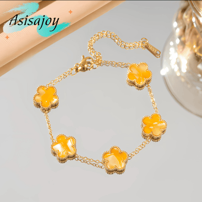 Essence - Pulsera floral en acero inoxidable y chapado en oro de 18k